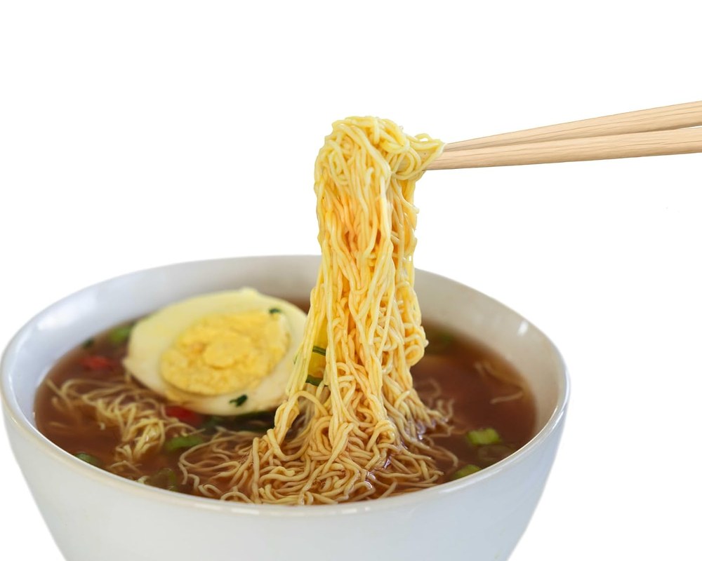 A finished bowl of spicy beef egg white ramen
