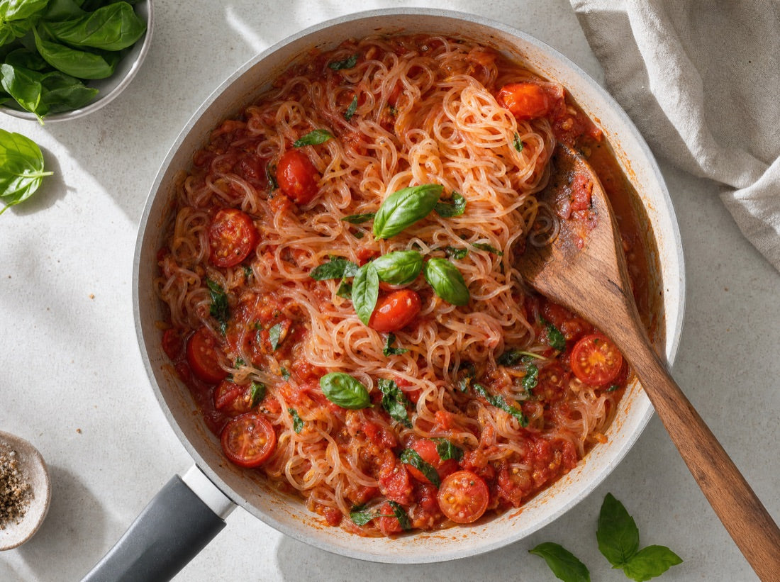 Noodles cooking in a pan