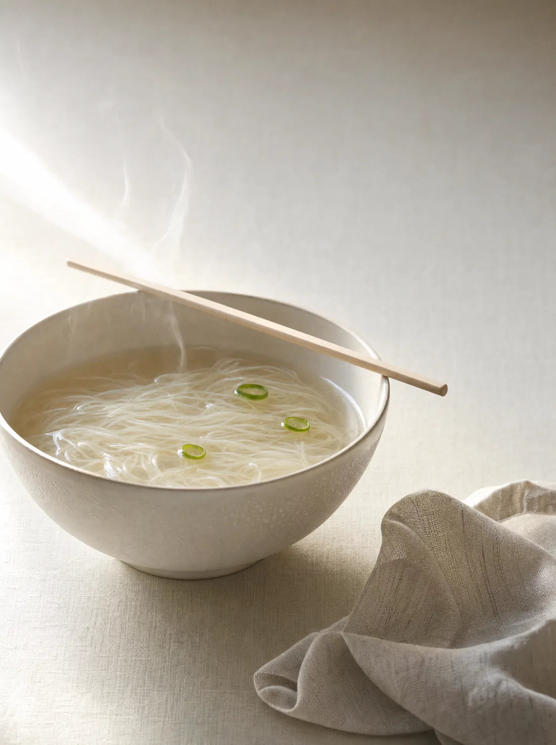 Noodles cooking in a pan
