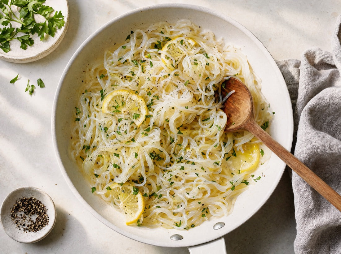 Noodles cooking in a pan